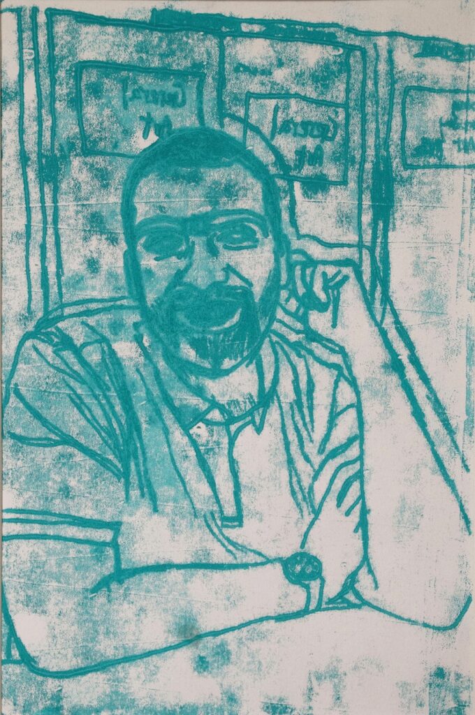 Green print of a bearded person with arms resting on a surface in front of a wall with squares of text