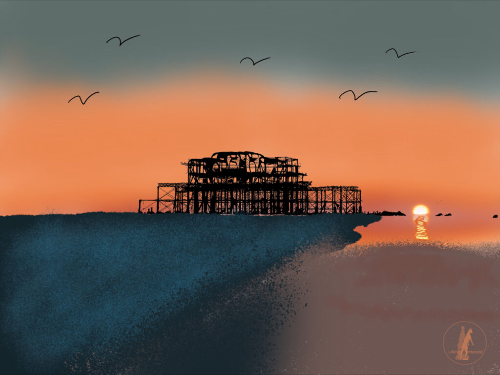 Brighton's West Pier stands against an orange sunset, with seagulls scattered in the sky, and the sea and beach dark in the foreground